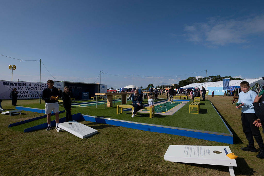 Families enjoying the fan village at the AIG Women's Open.
